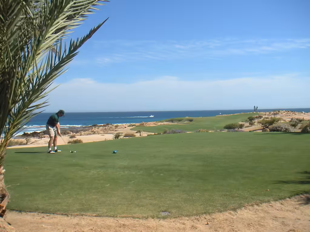Golfer on a clifftop oceanfront hole at Cabo del Sol, Cabo Corridor, Los Cabos