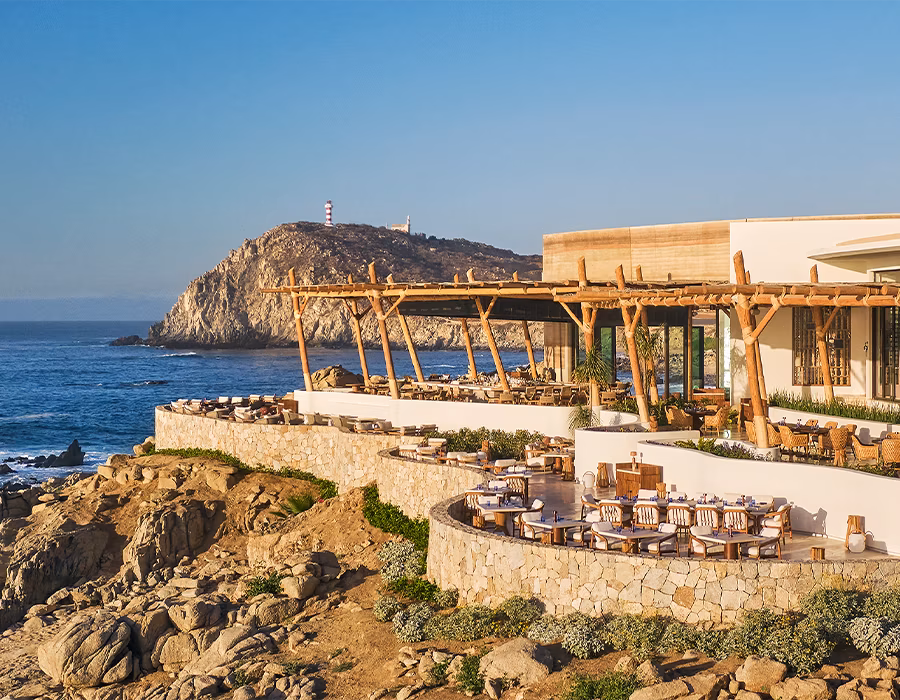 Golfer on a clifftop hole with the Sea of Cortez beyond, Cove Club golf lifestyle, Cabo Corridor, Los Cabos