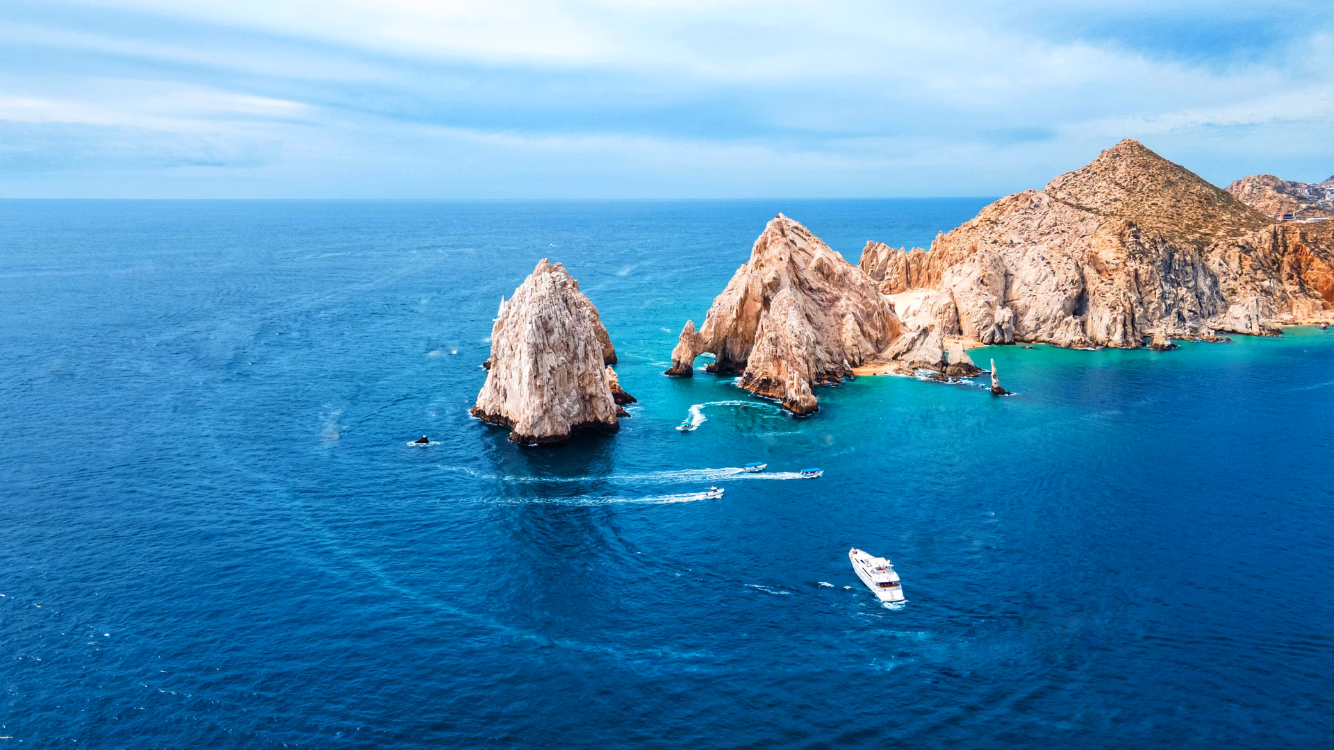 Aerial view of El Arco de Cabo San Lucas with boats and turquoise water, Pedregal setting, Cabo San Lucas, Los Cabos